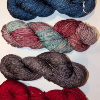 Blue Jean, Cloud Sunshine, Cereza and Lotus merino wool skeins