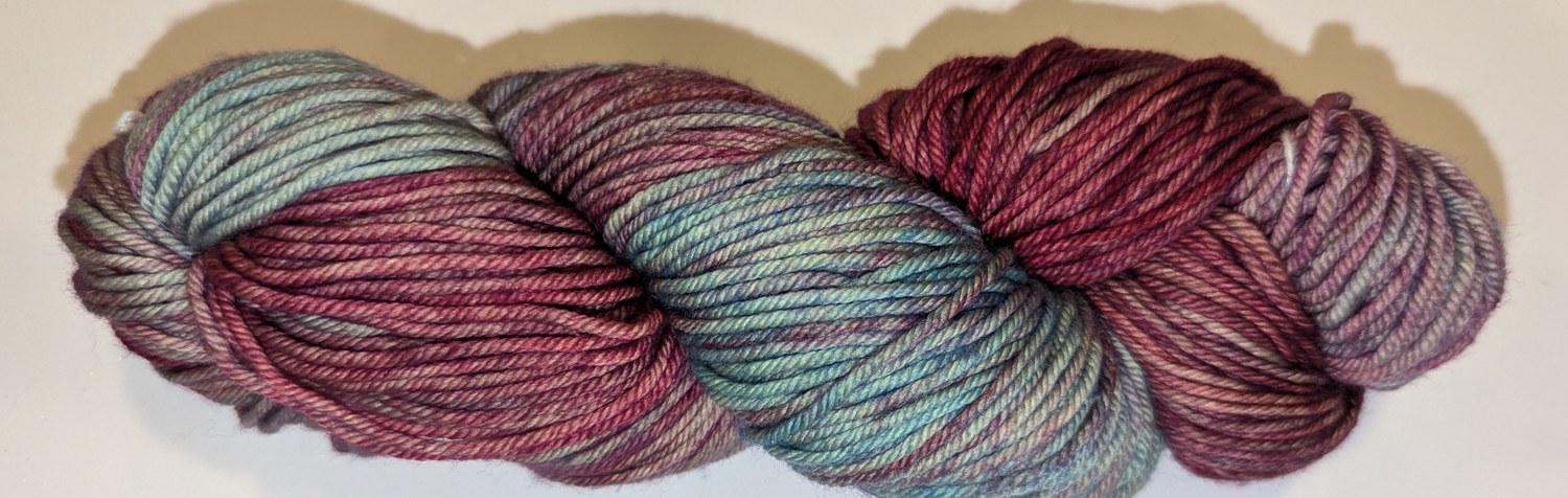 Lotus — a soft pink and blue merino wool